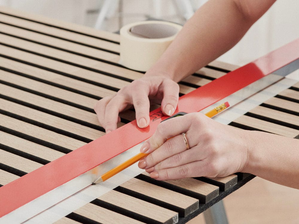 Step 2: Mark the cutting lines on the panel with a pencil and tape.