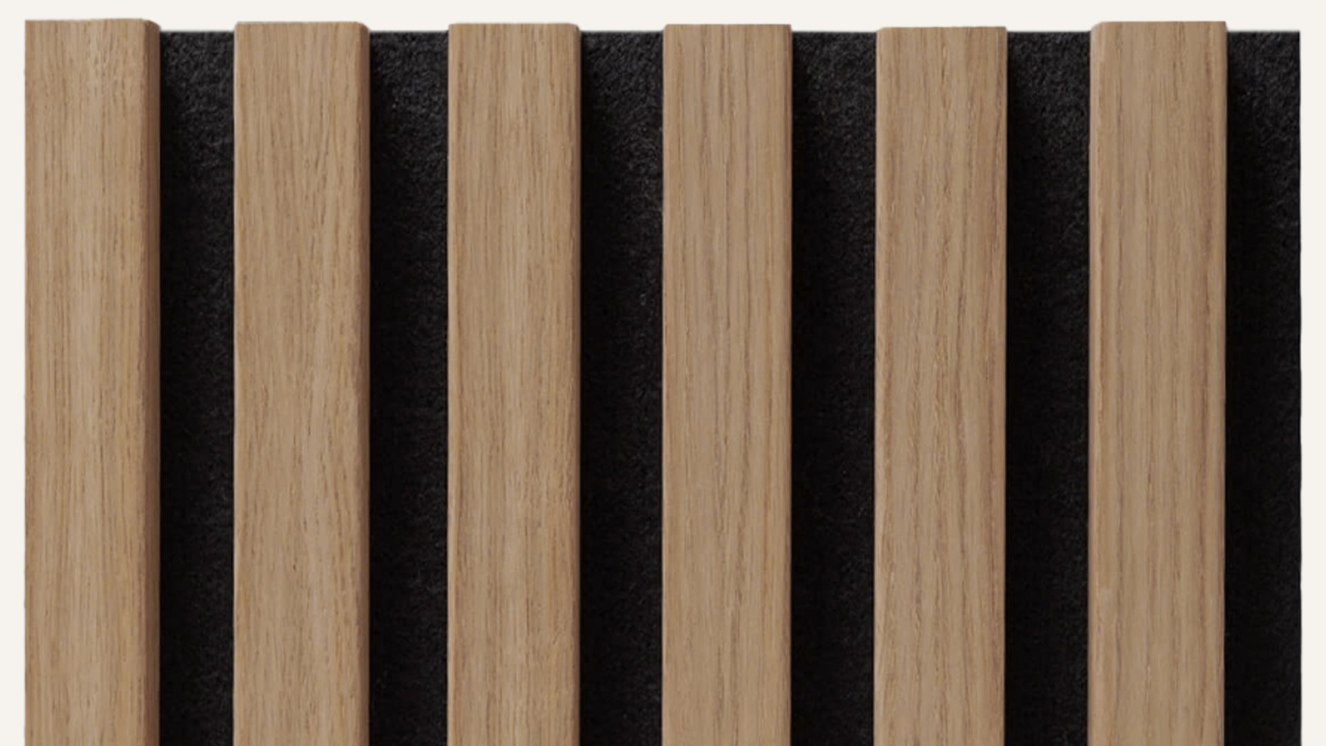 Close view of real-wood veneer slat faces with acoustic felt backing.