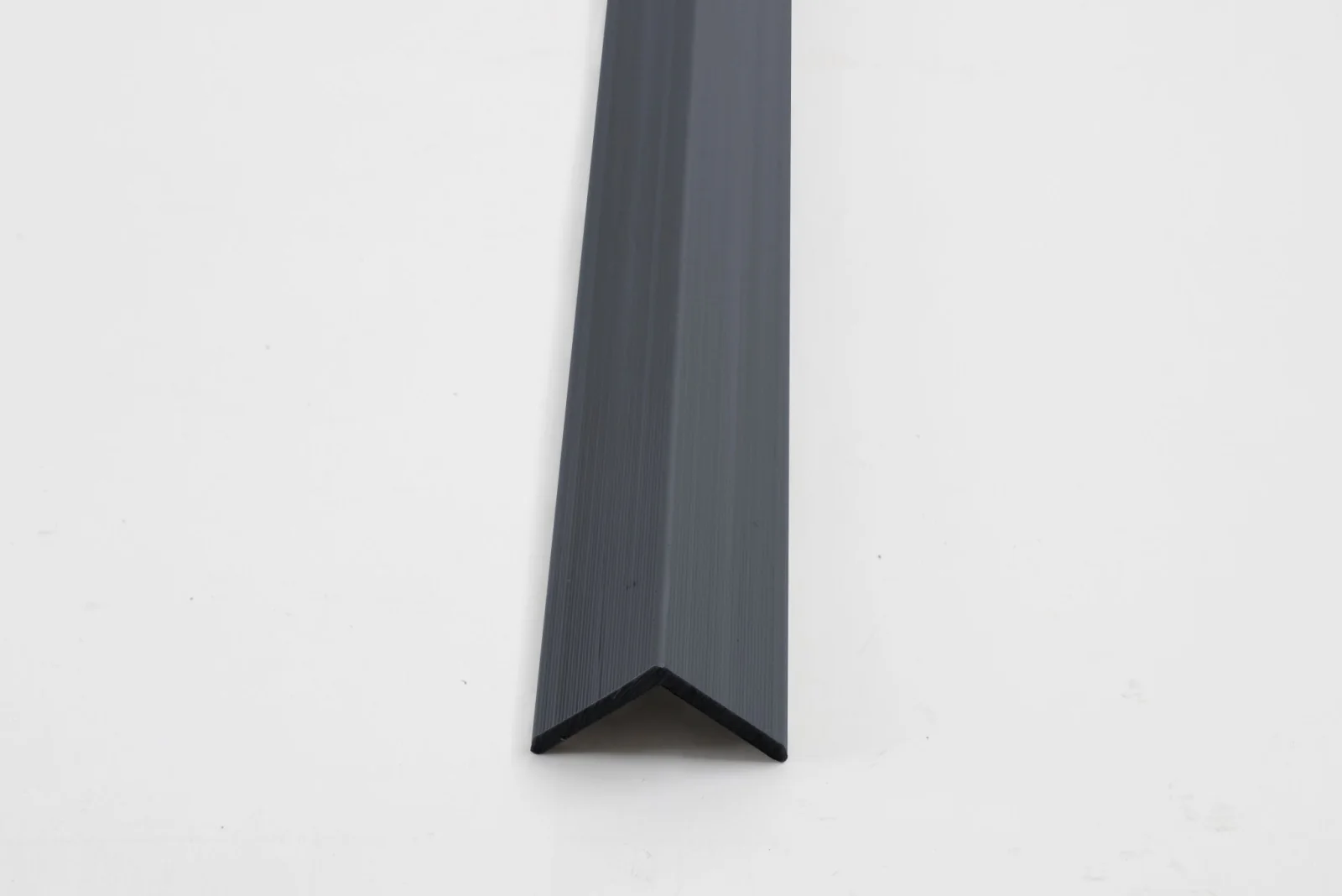 Light gray exterior composite siding end cap L trim