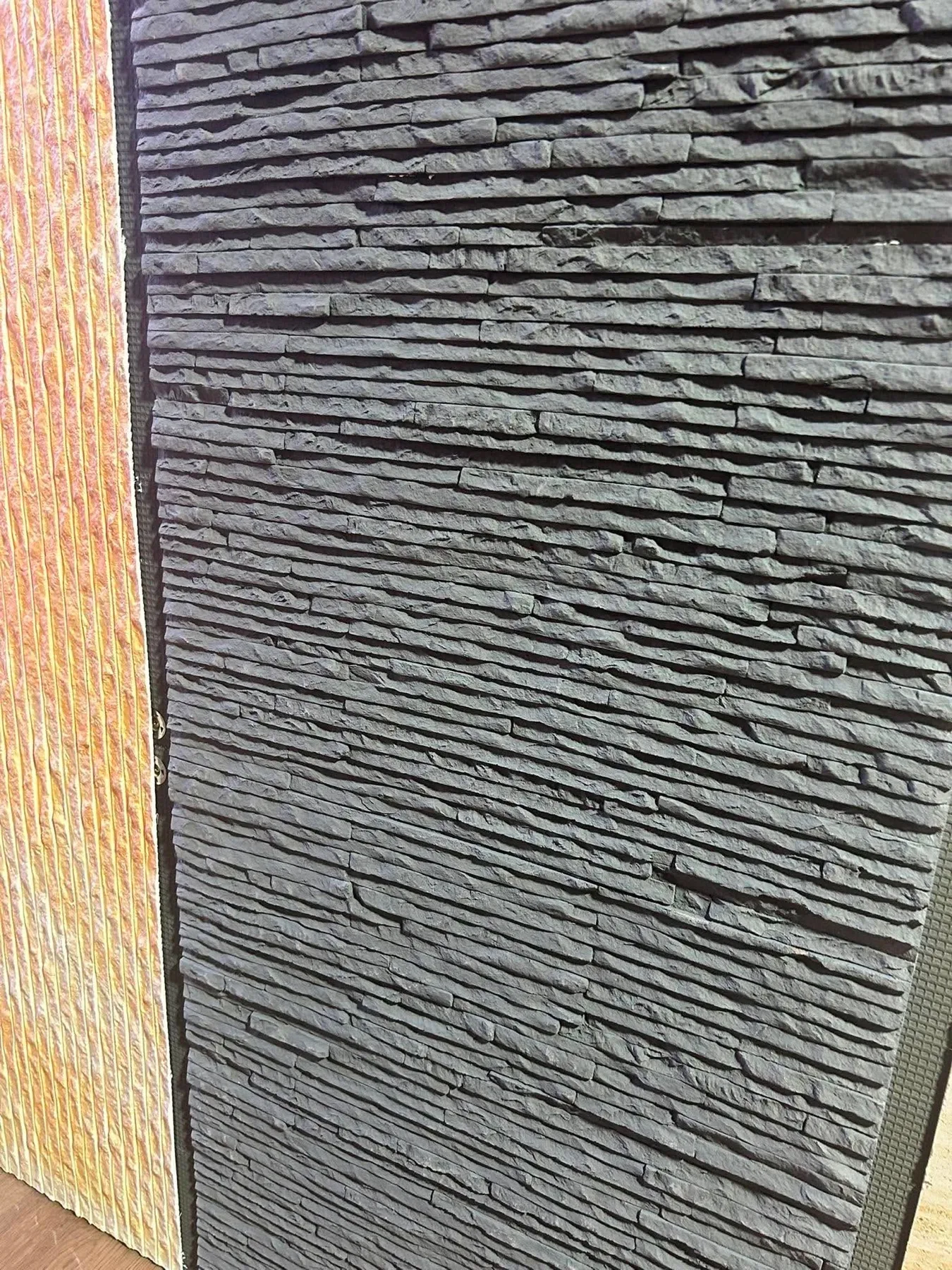 Charcoal stacked ledgestone flexible wall panel texture