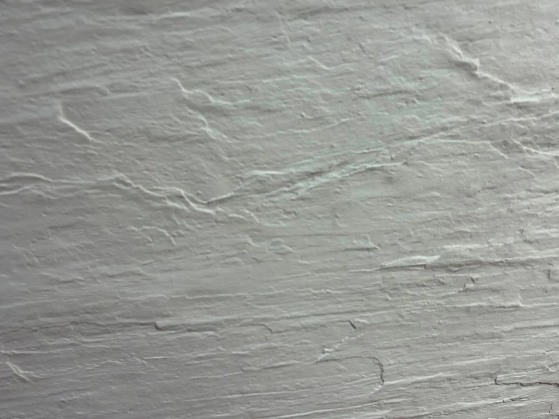 Light gray flexible stone with soft horizontal mineral veining