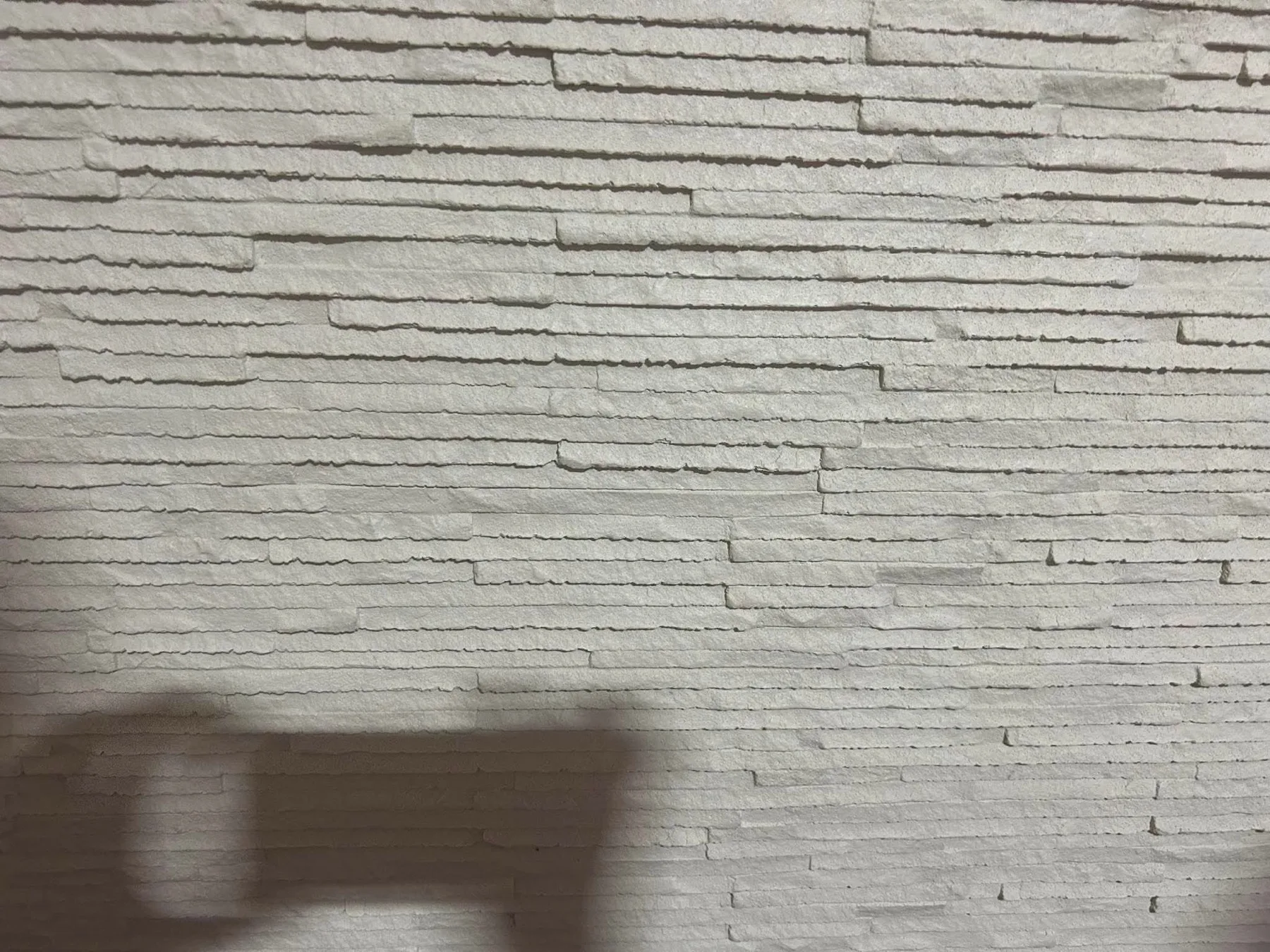 White narrow ledgestone flexible wall panel texture