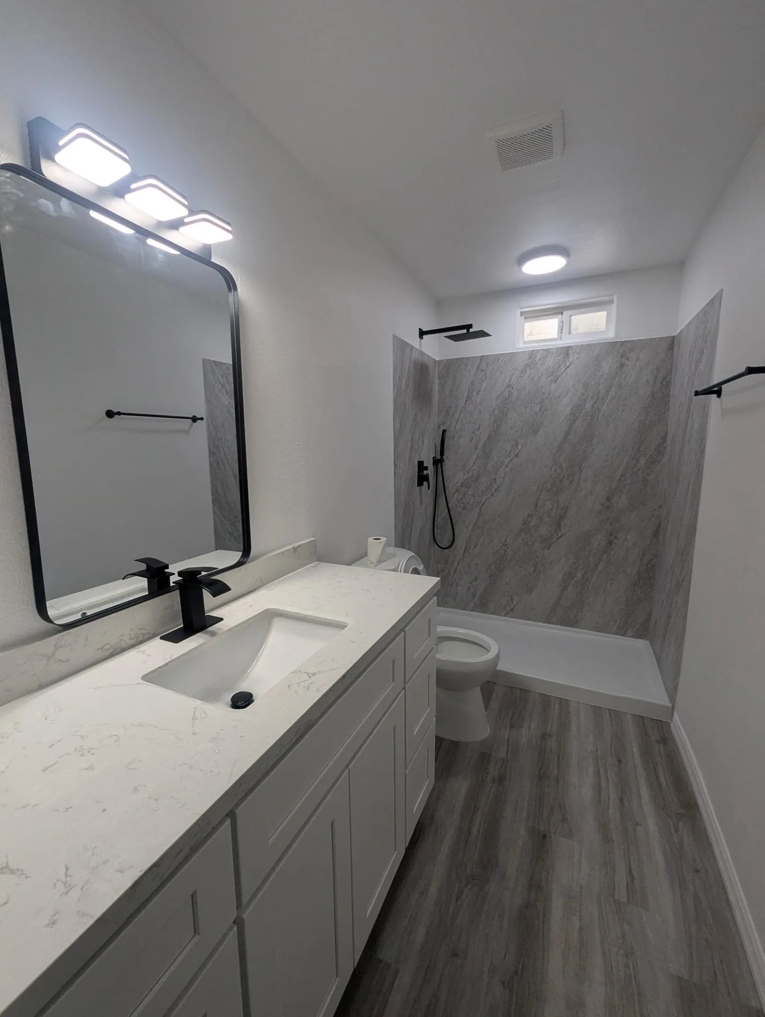 3D Textured Grey PVC marble panels in a customer bathroom installation