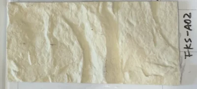 Ivory Rock sample showing its creamy ivory color and sculpted rock texture